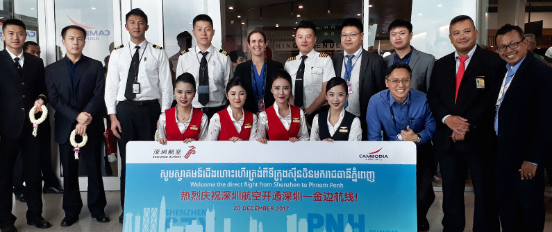 Staff from Shenzhen Airlines and Cambodia Airports celebrate the carrier's new route linking Phnom Penh and Shenzhen city last December.